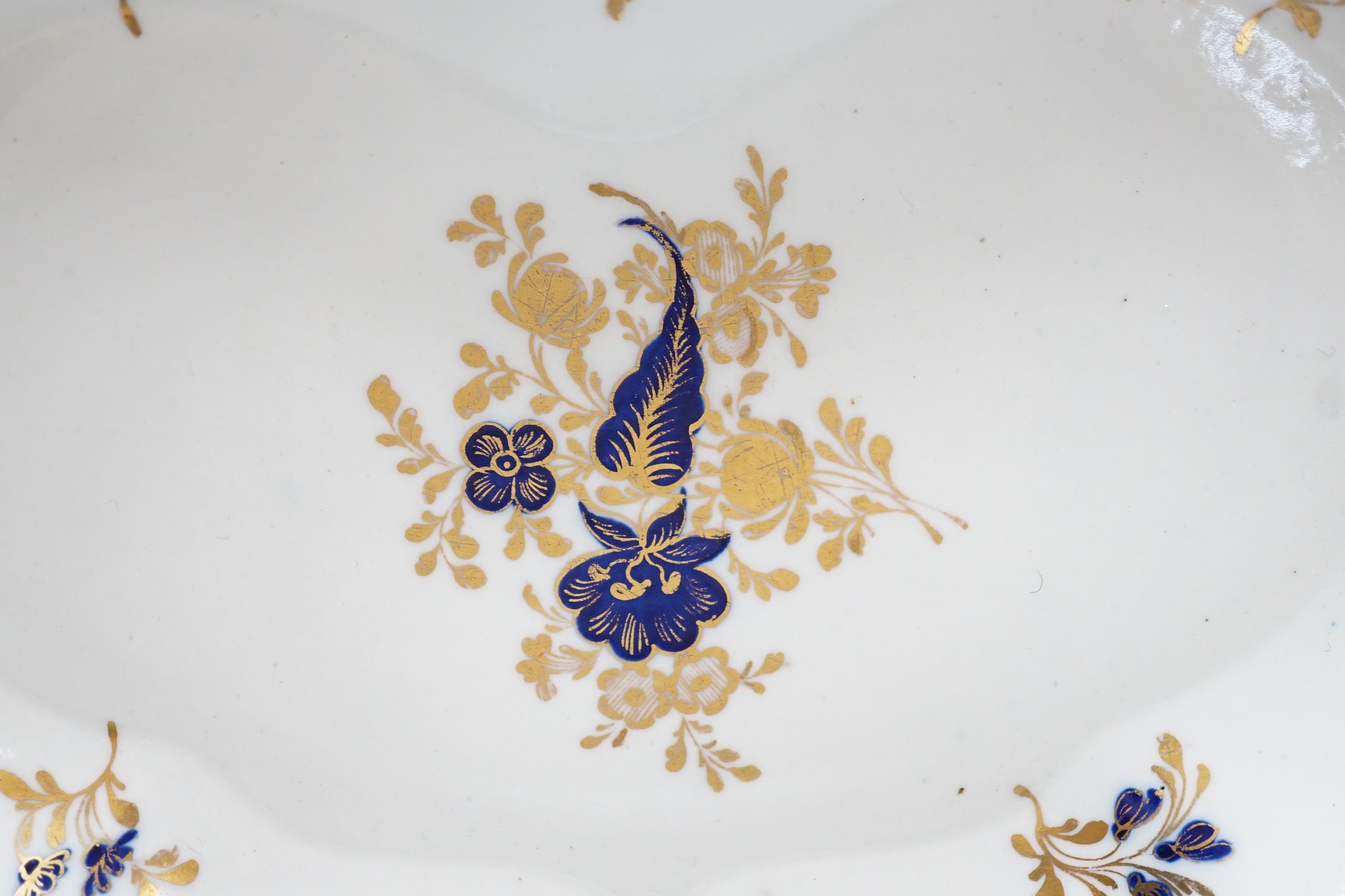 An 18th century Caughley kidney shaped dish with blue and gilt decoration, 28cms wide